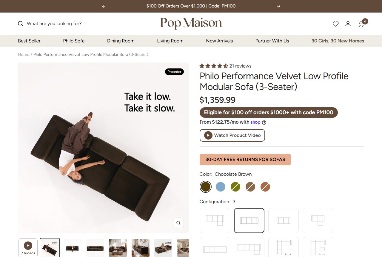 The Philo Performance Velvet 3-Seater listed at $1,359.99 with the PM100 code banner and a 30-day free returns badge, captured from popmaison.com on October 22, 2026.